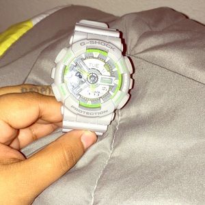 Lime green and grey g-shock watch